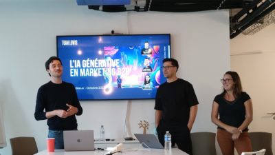 les 3 intervenants devant l'écran de présentation
